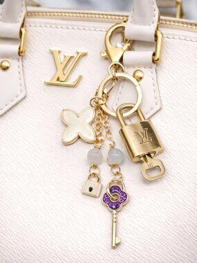 Authentic Louis Vuitton Gold Lock & Key 🔑 Bag Charm w/ Unbranded Charm